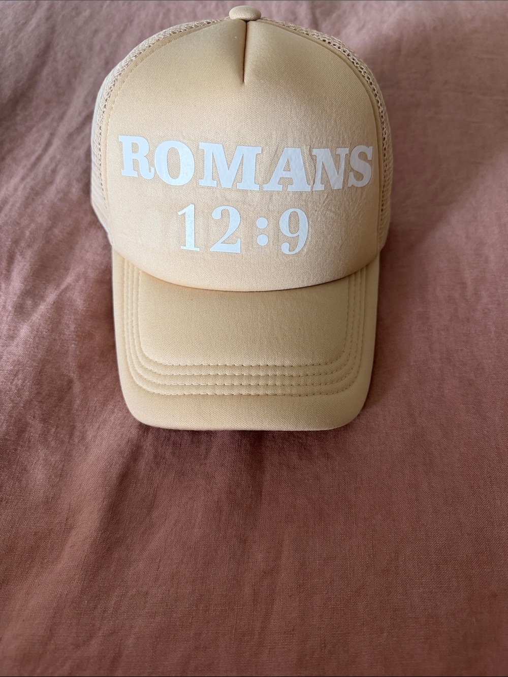 ROMANS 12:9 Beige Trucker Hat